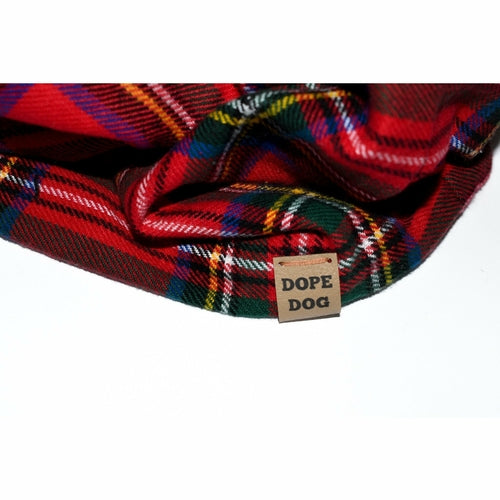 Plaid fabric with a 'Dope Dog' label on a white background